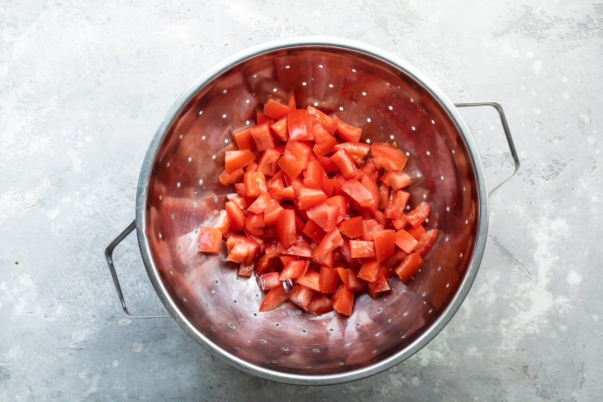 Tomatoes in a colander.