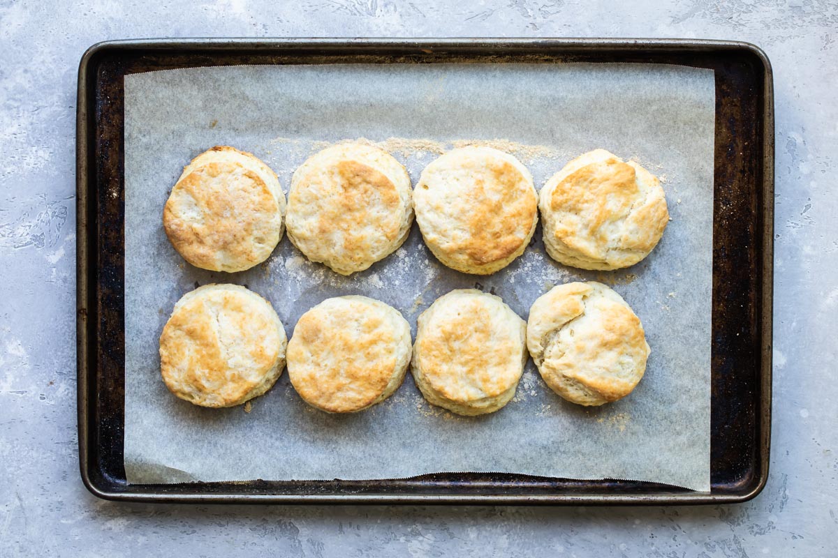 Baked biscuits on a baking sheet.