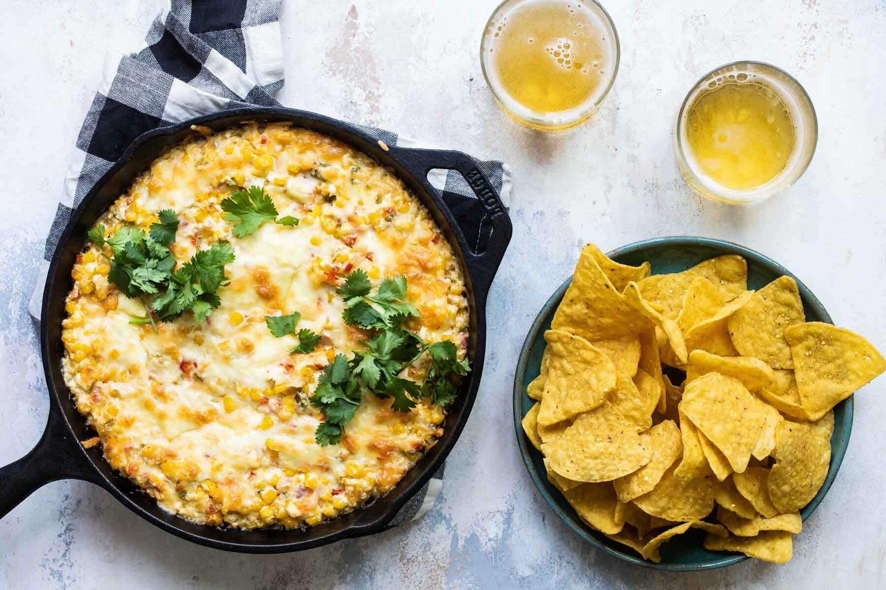 A skillet with hot corn dip.
