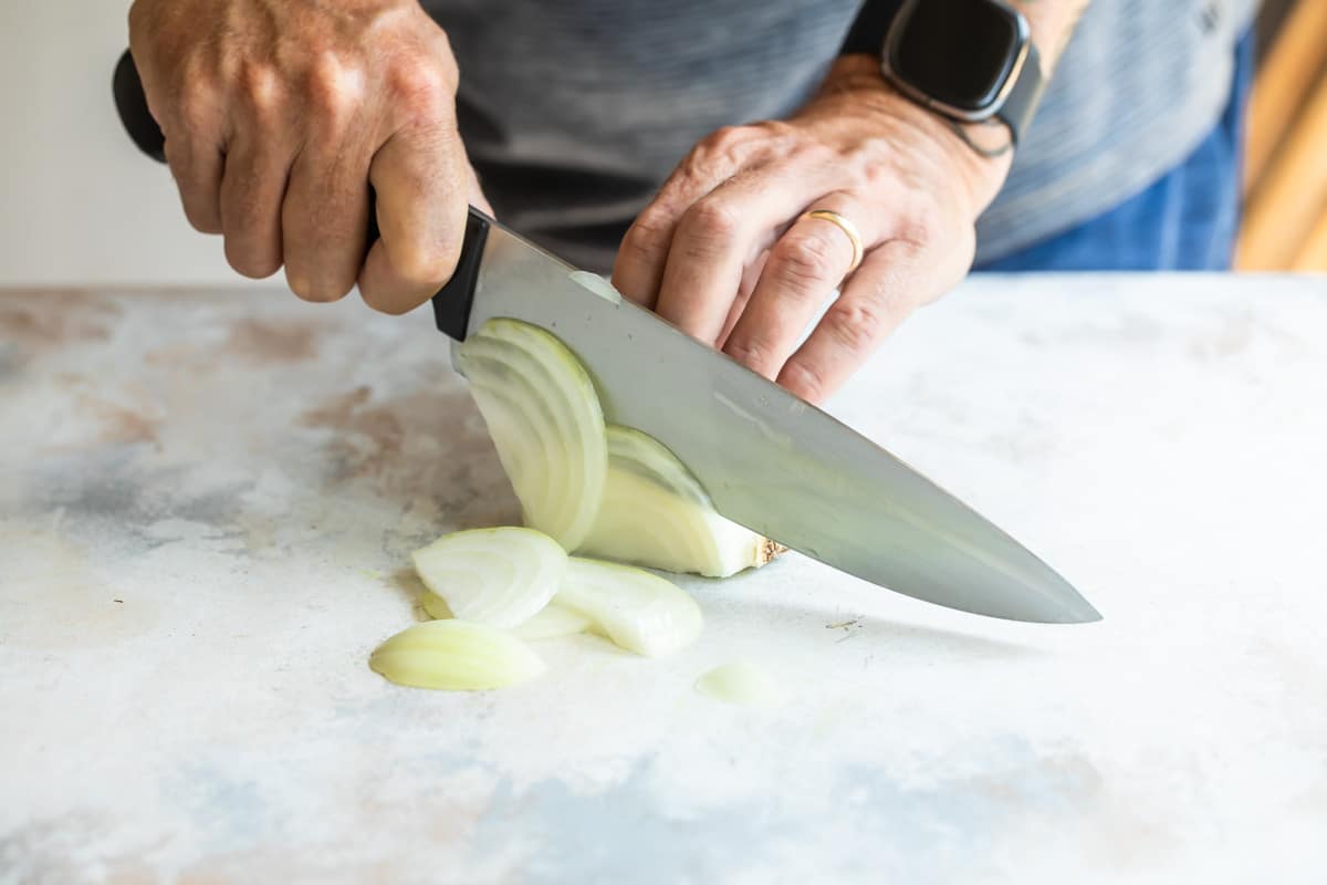 Slicing an onion.