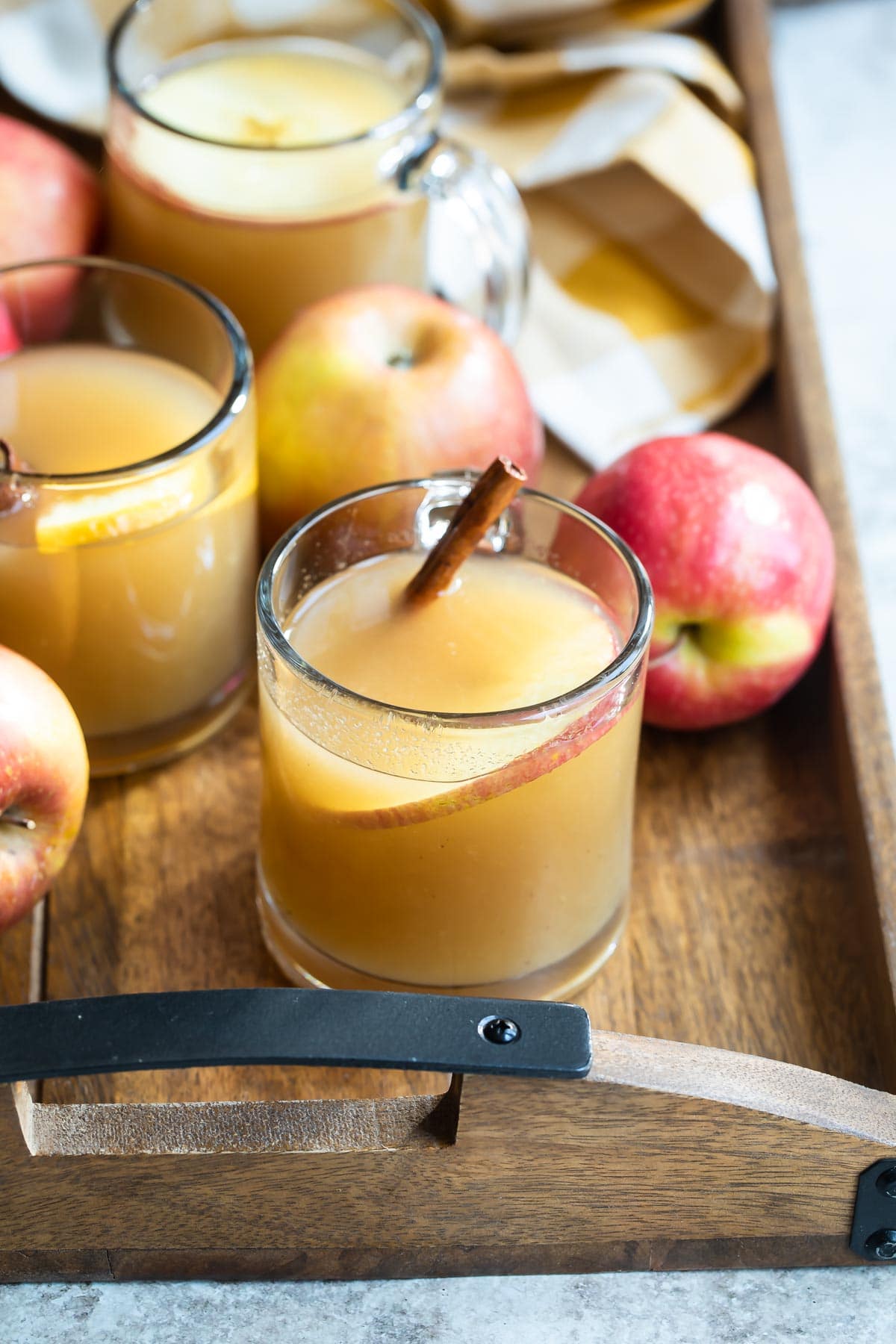 Apple cider in a clear glasses.