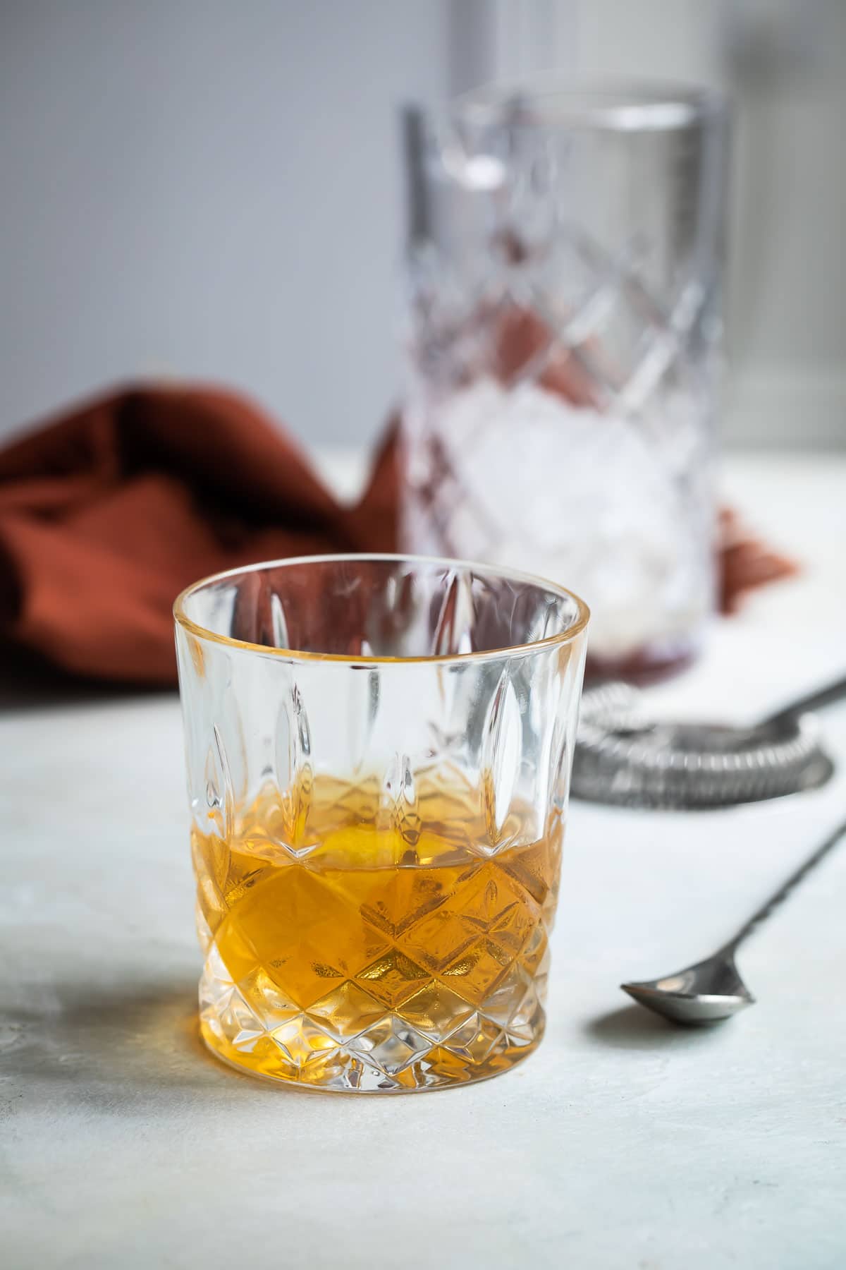 A Sazerac cocktail in a lowball glass.