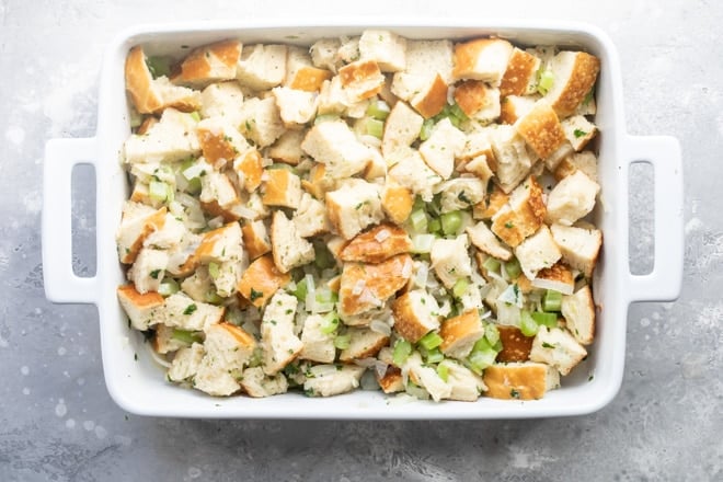 A pan of unbaked bread stuffing.