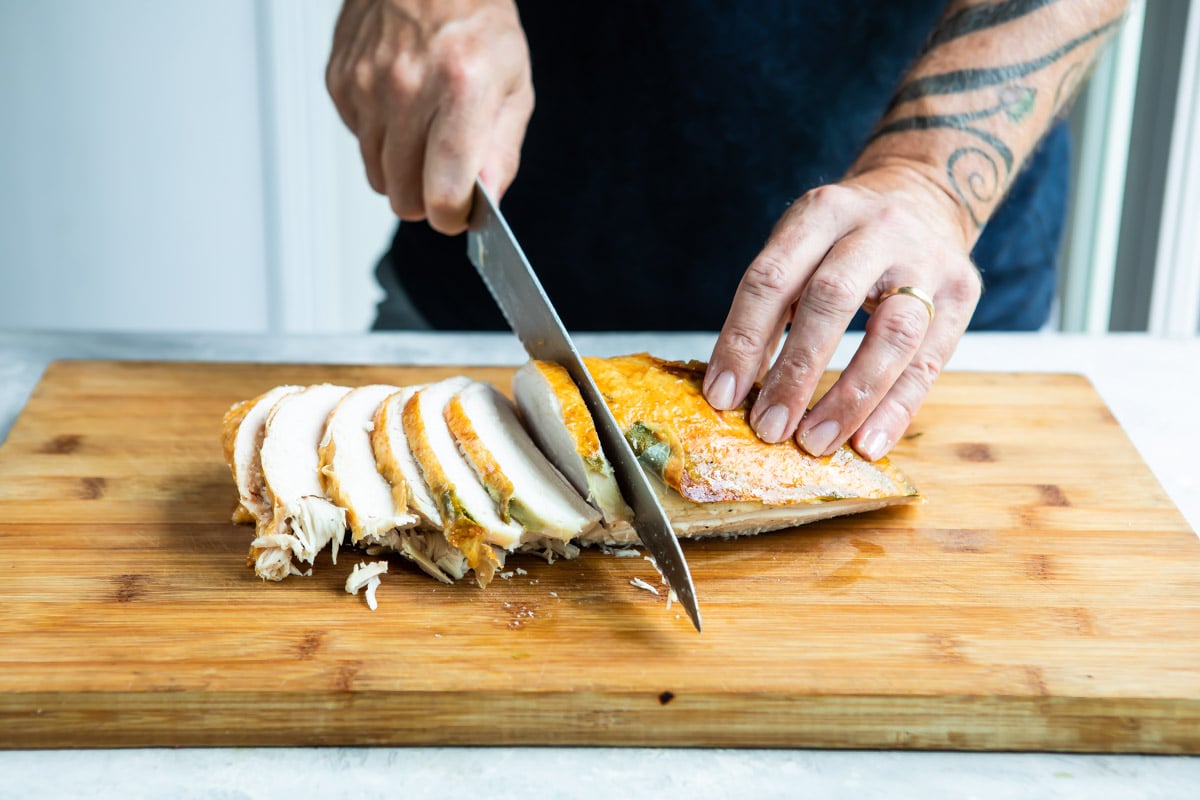 Carving a turkey breast.
