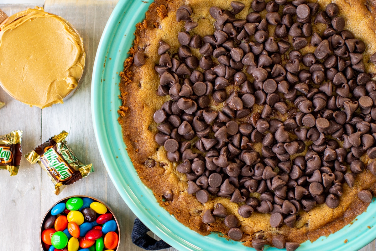 Building a chocolate chip cookie cake.