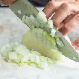 Dicing an onion.