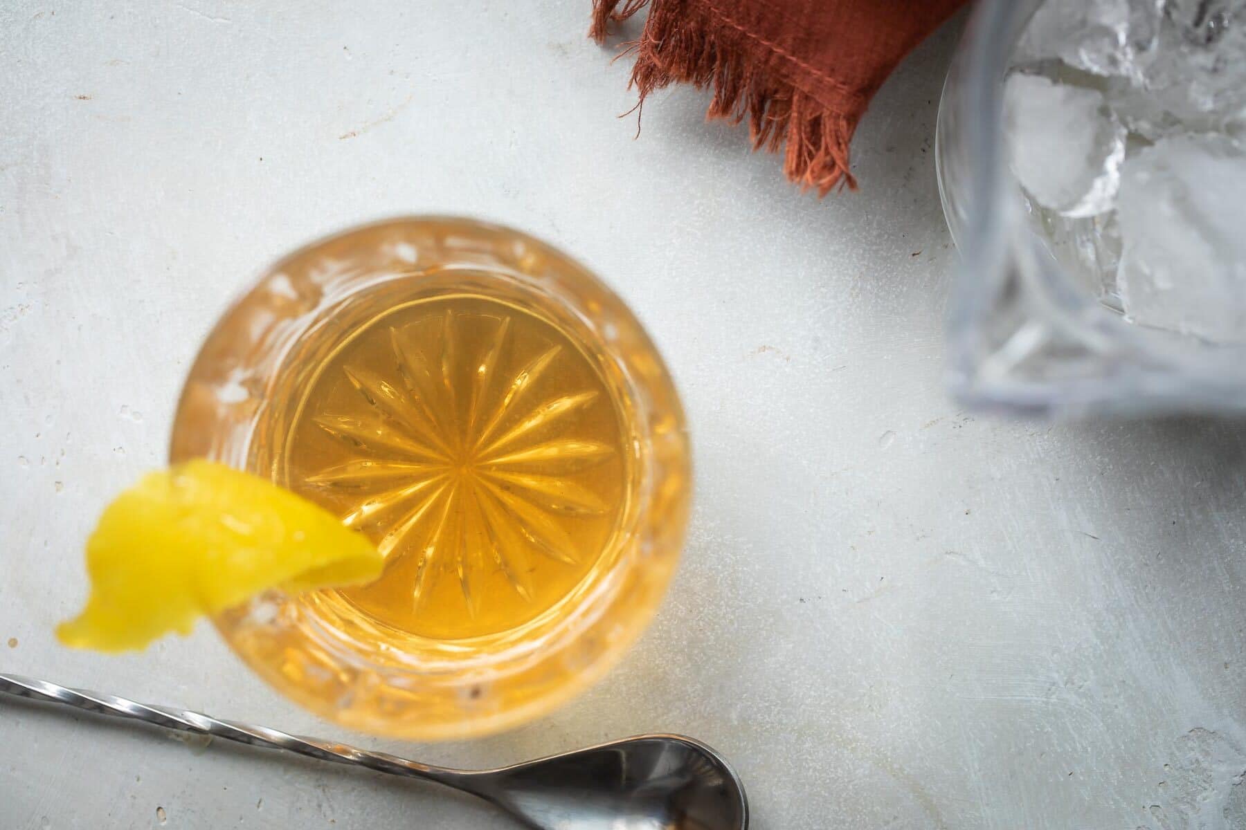 A Sazerac cocktail in a lowball glass.