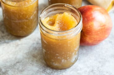 A mason jar filled with apple butter.