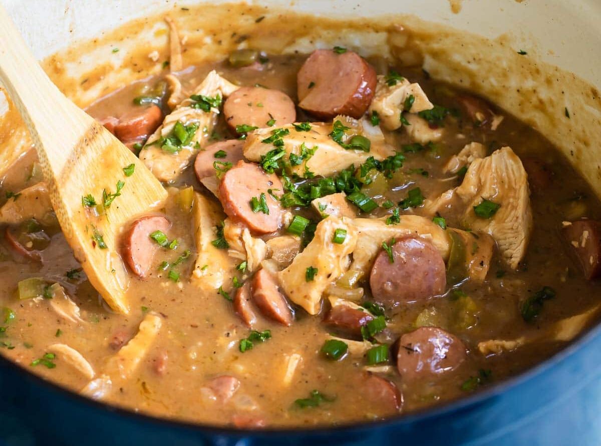 Chicken gumbo being cooked in a Dutch oven.