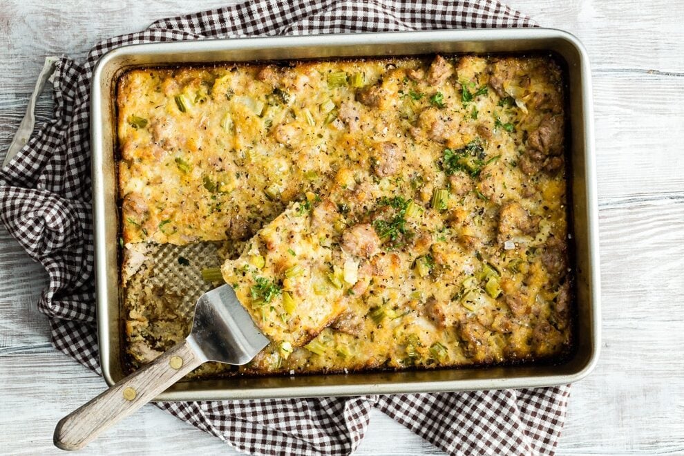 This easy Cornbread Dressing with sausage is baked outside the bird but still so buttery and moist! Bring a taste of the South to your Thanksgiving table.