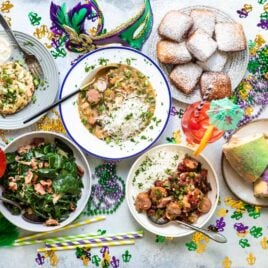 A table filled with various Mardi Gras food.