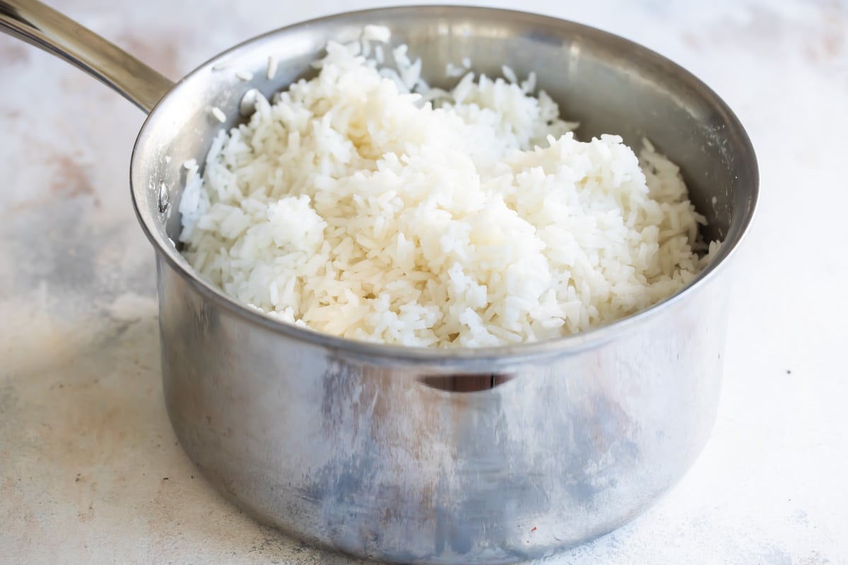White rice in a silver saucepan.