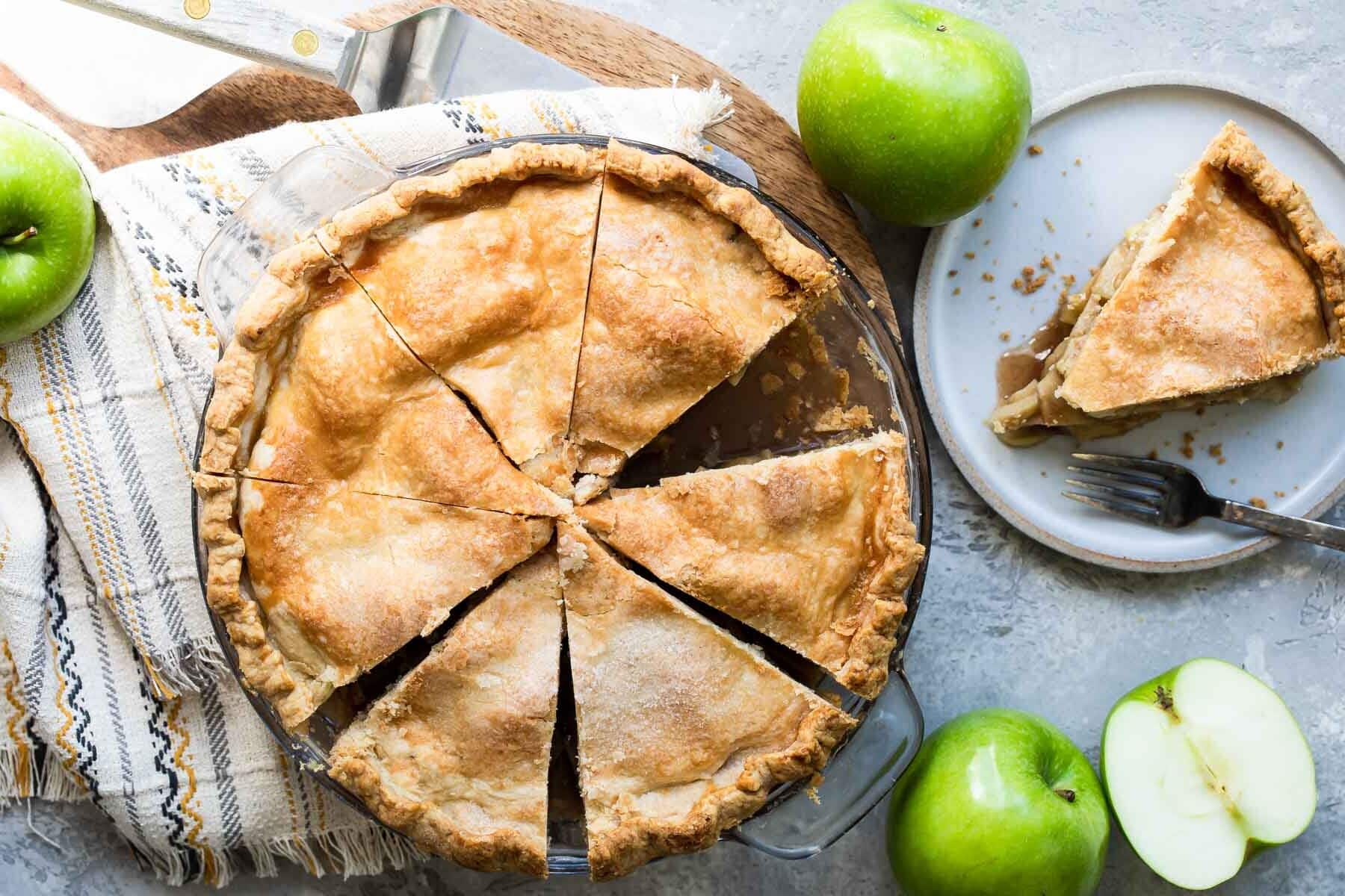A sliced apple pie.