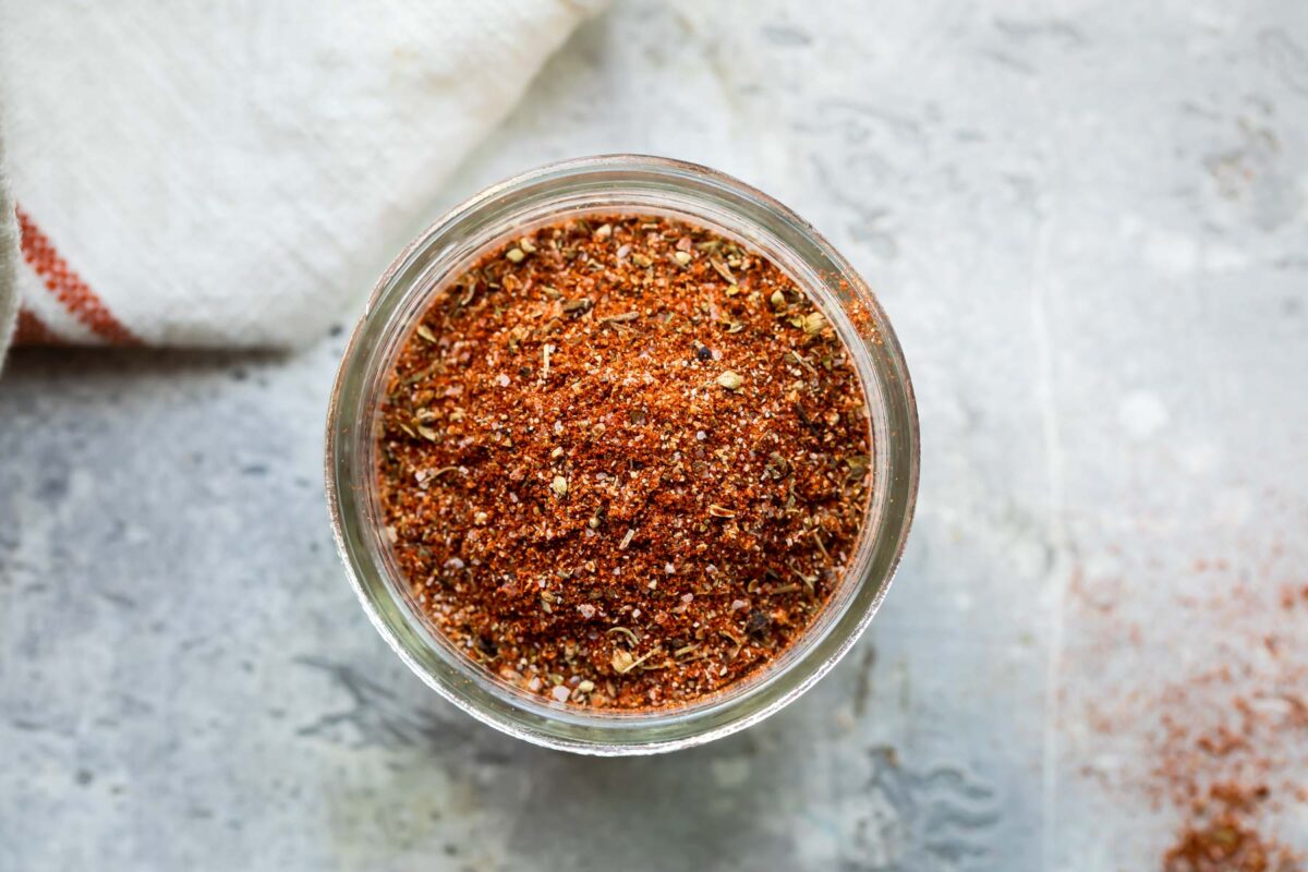 Creole seasoning in a small spice jar.