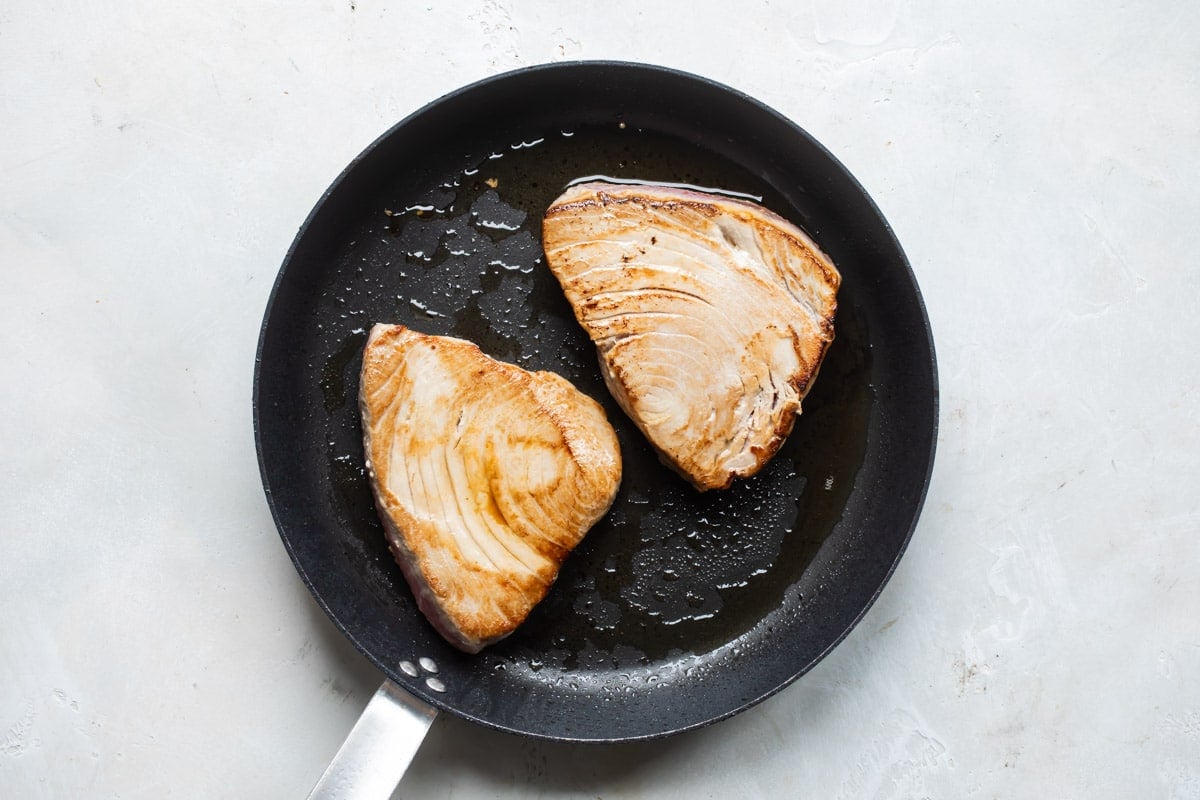 Ahi tuna in a frying pan.