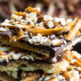 A stack of Christmas crack on a plate.
