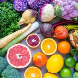 An assortment of citrus, cruciferous vegetables, and root vegetables (seasonal produce for the month of February).