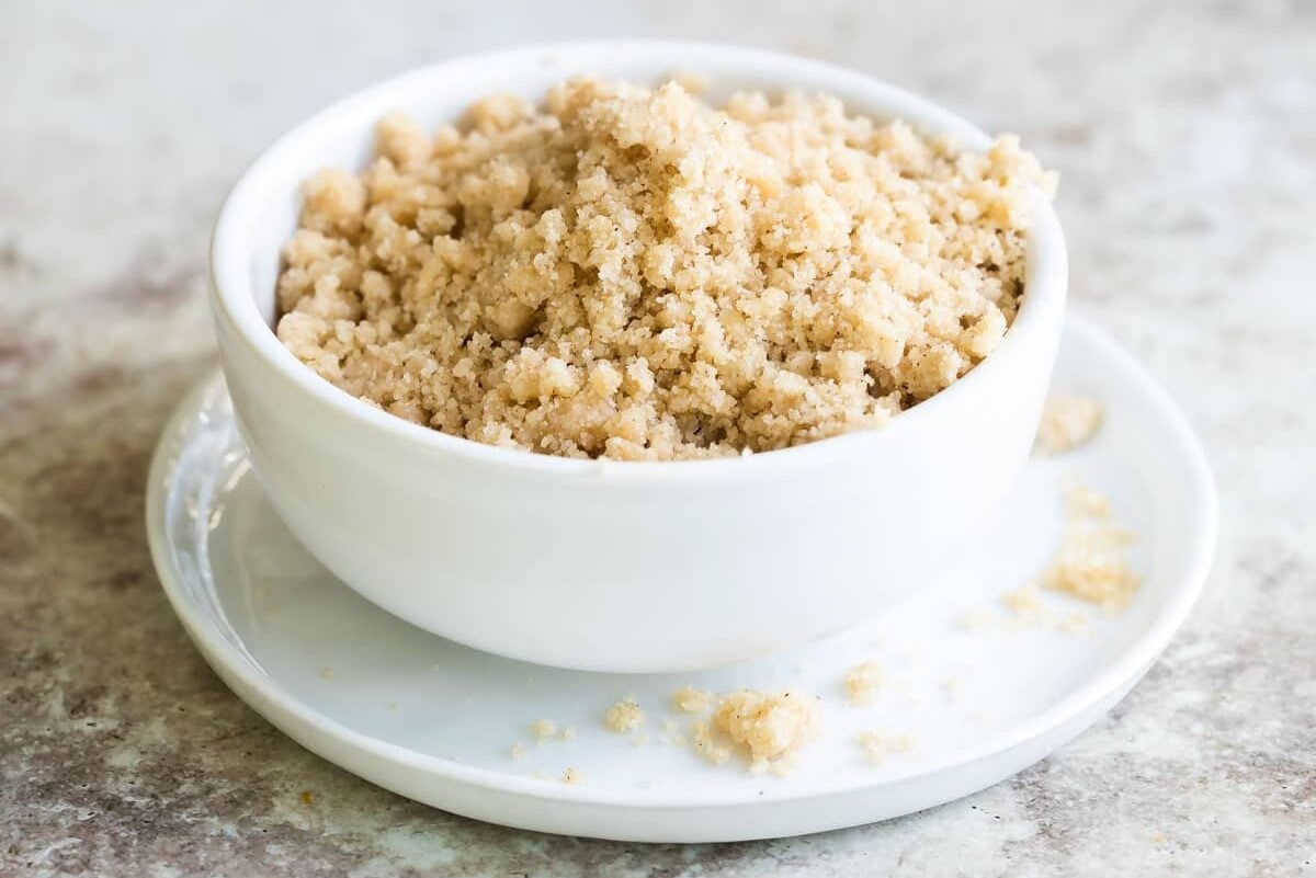Streusel topping in a small white bowl.