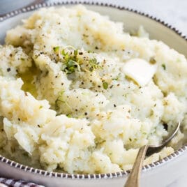 A bowl of Cauliflower mashed potatoes.