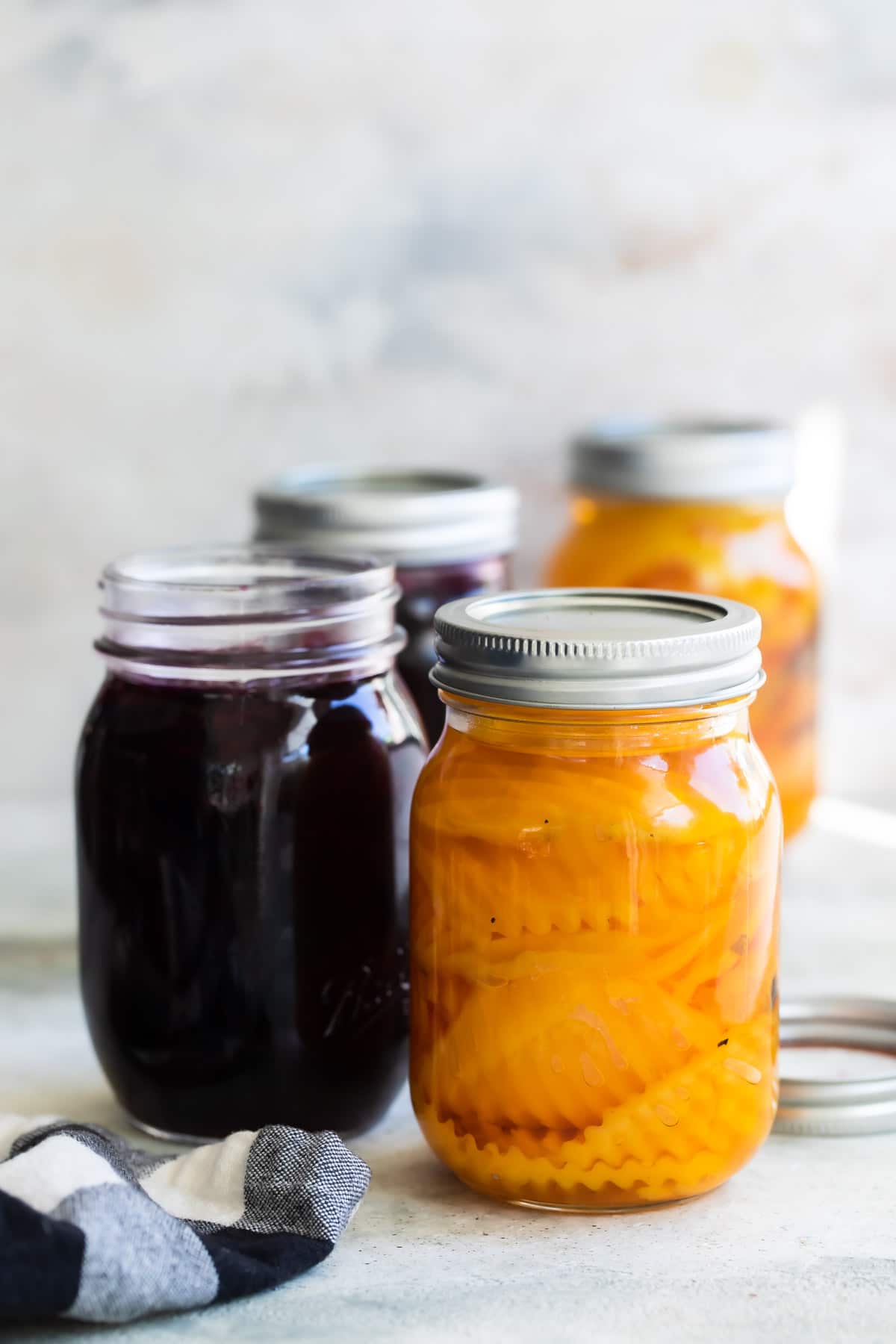 Four jars of pickled beets.