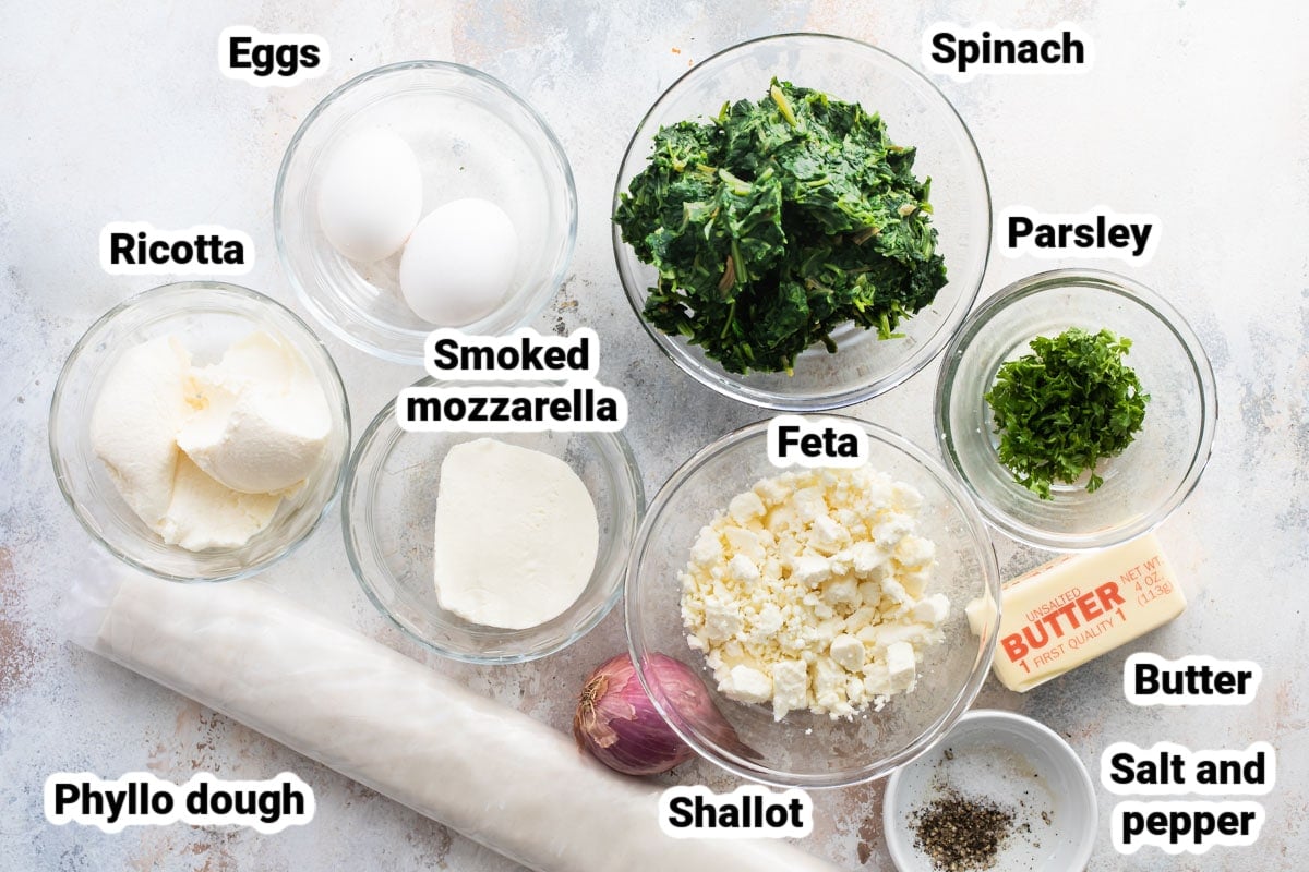 Labeled ingredients for spanakopita triangles.