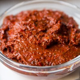Harissa in a clear bowl.