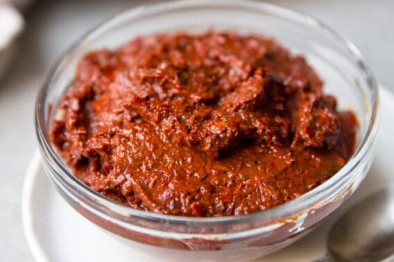 Harissa in a clear bowl.