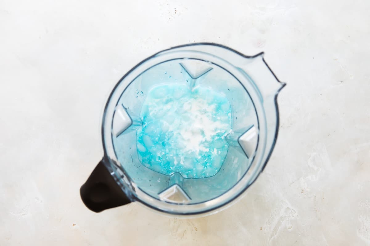 Blue Hawaiian cocktail mix in a blender.