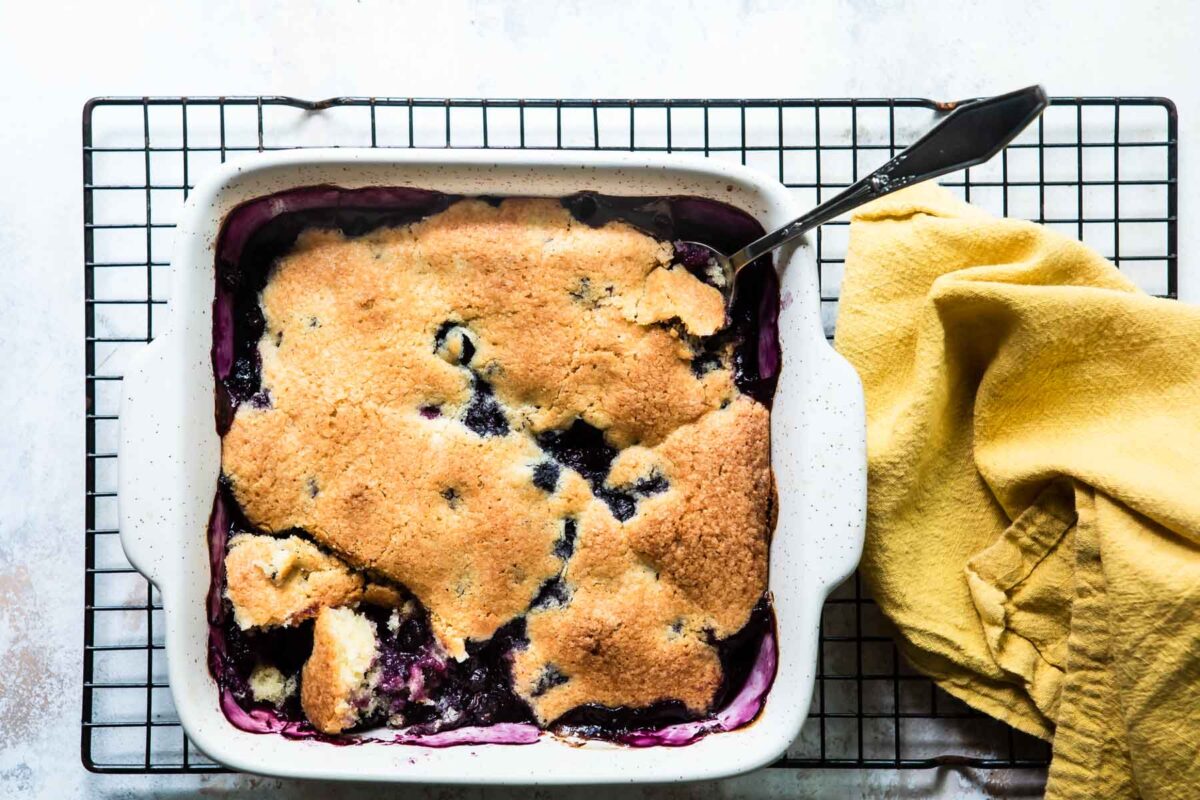 A baking dish of blueberry cobbler.