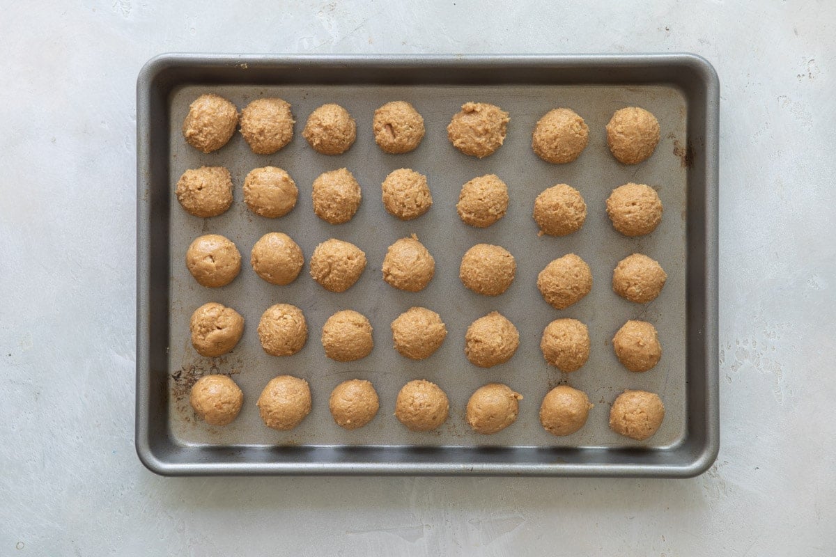 No bake peanut butter balls before being coated in chocolate.
