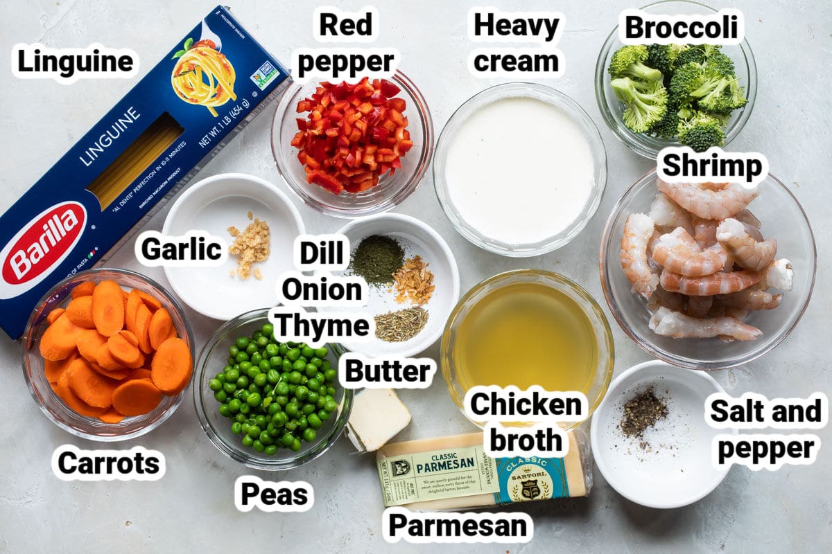 Labeled ingredients for one pot shrimp pasta primavera.