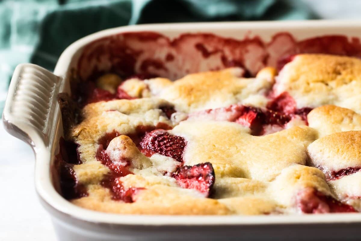 A baking dish of strawberry cobbler.
