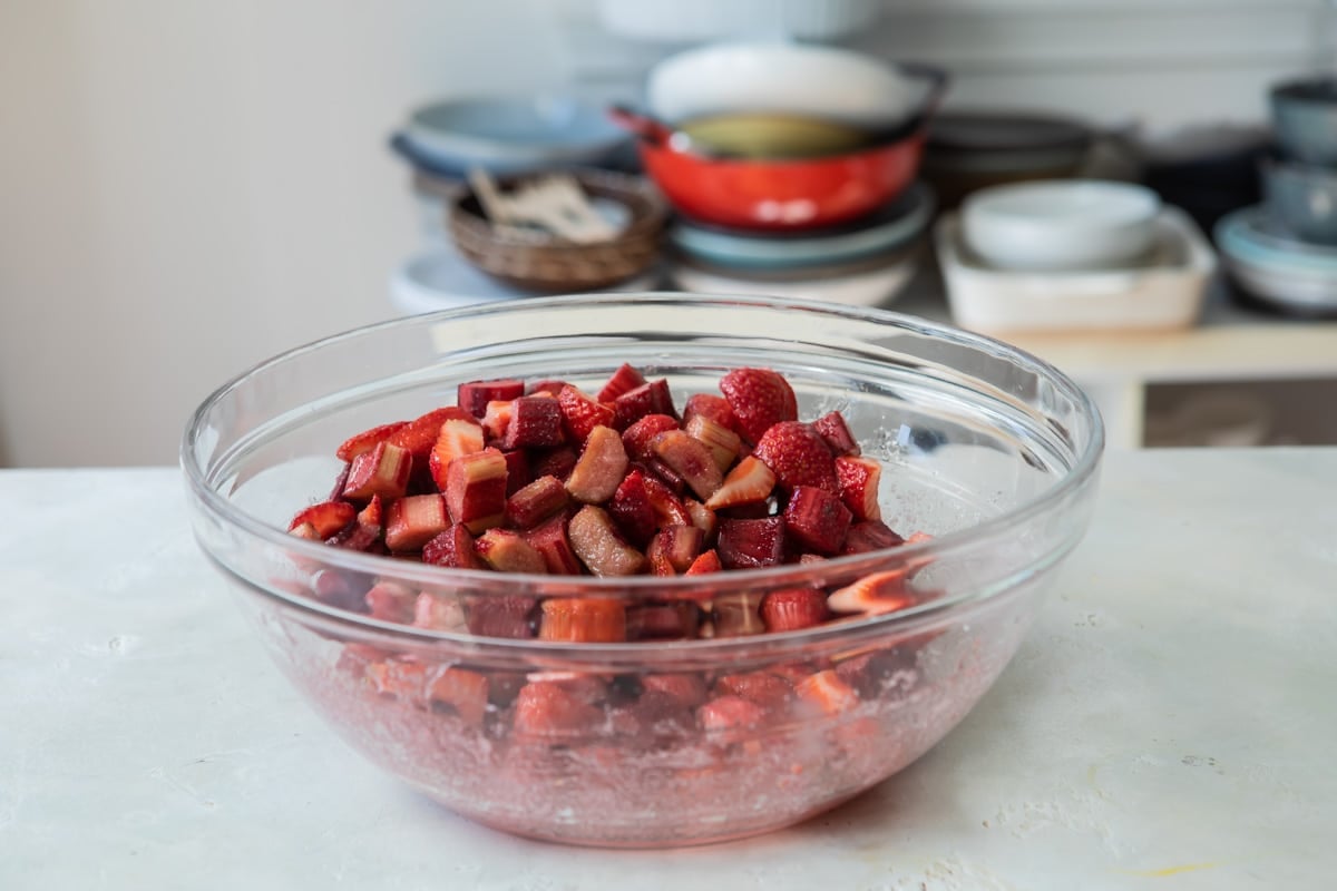 A bowl of filling for strawberry rhubarb pie.