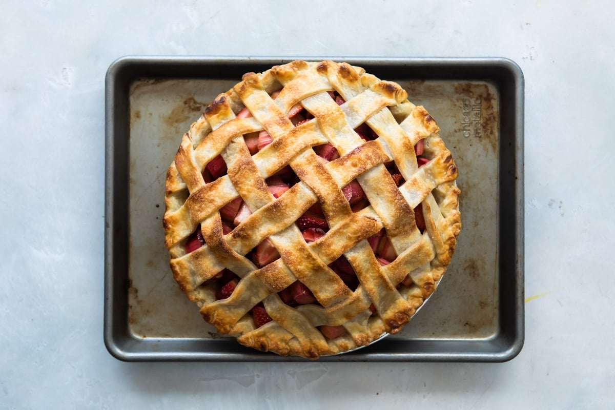 A baked strawberry rhubarb pie.