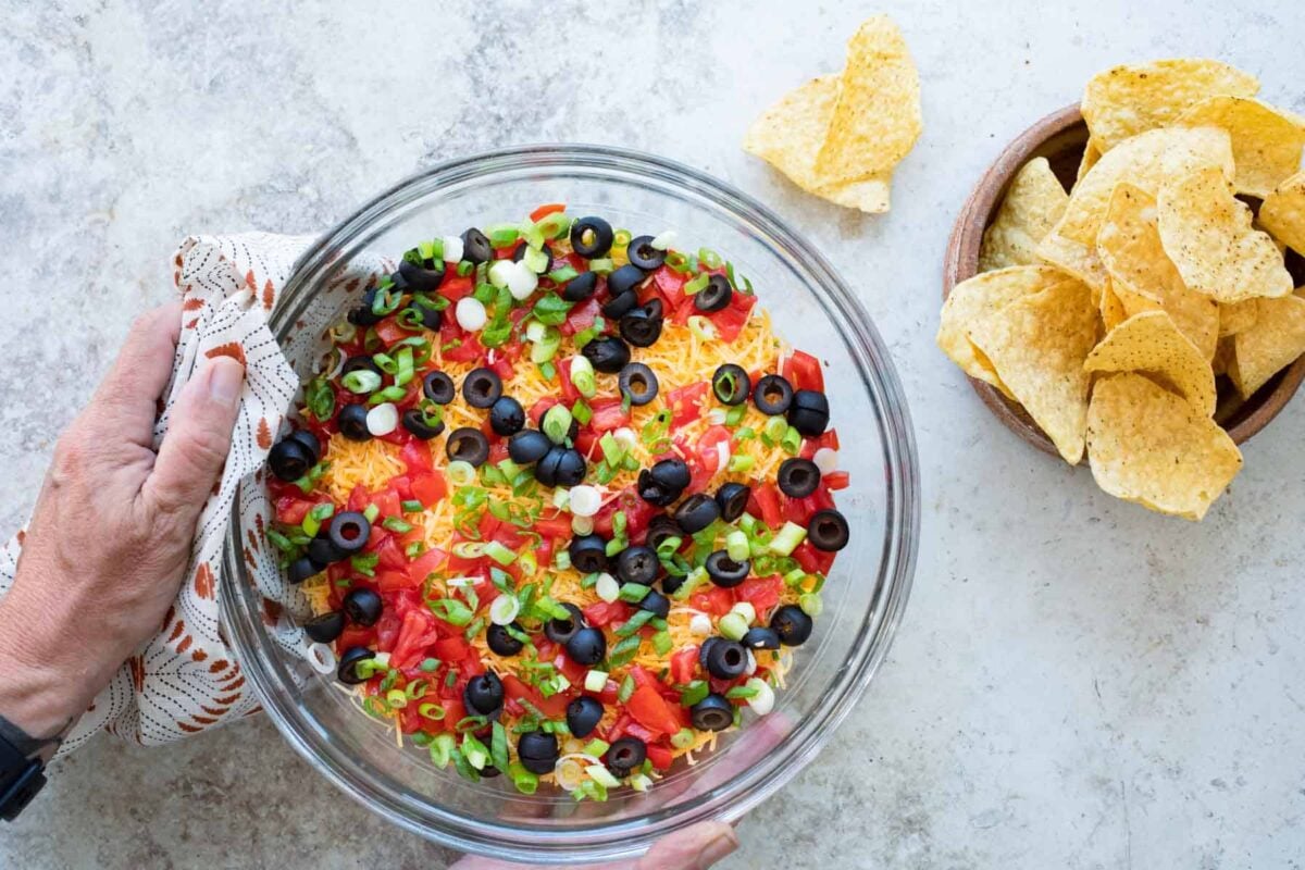 A bowl of seven layer dip.