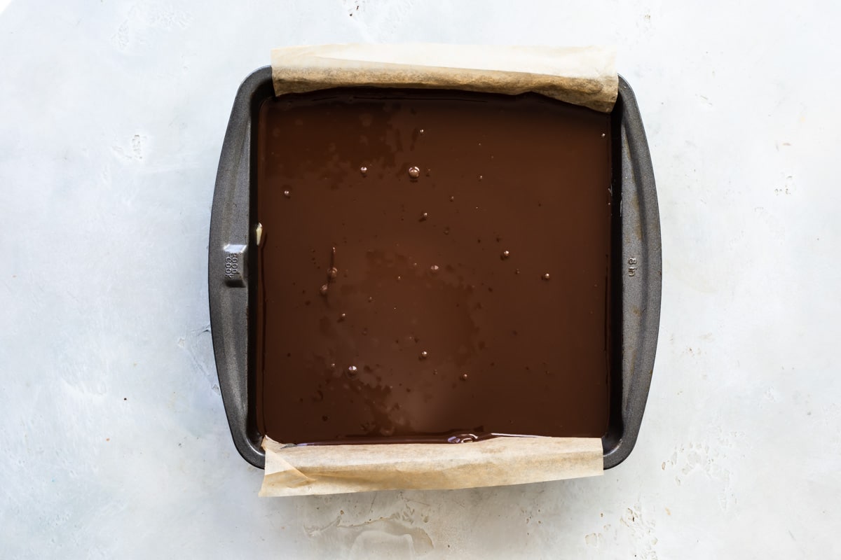 A baking pan filled with Millionaire's Shortbread.