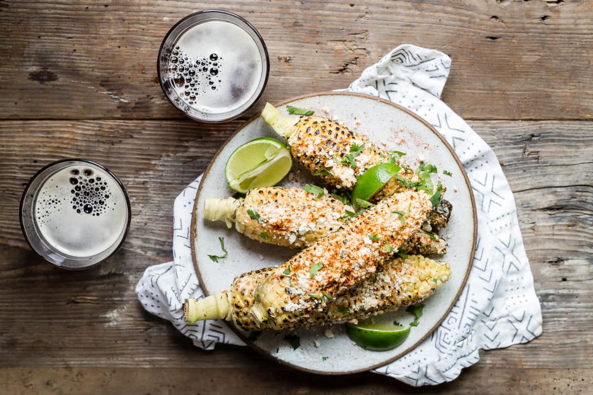 Ears of Mexican Street Corn in a dish.