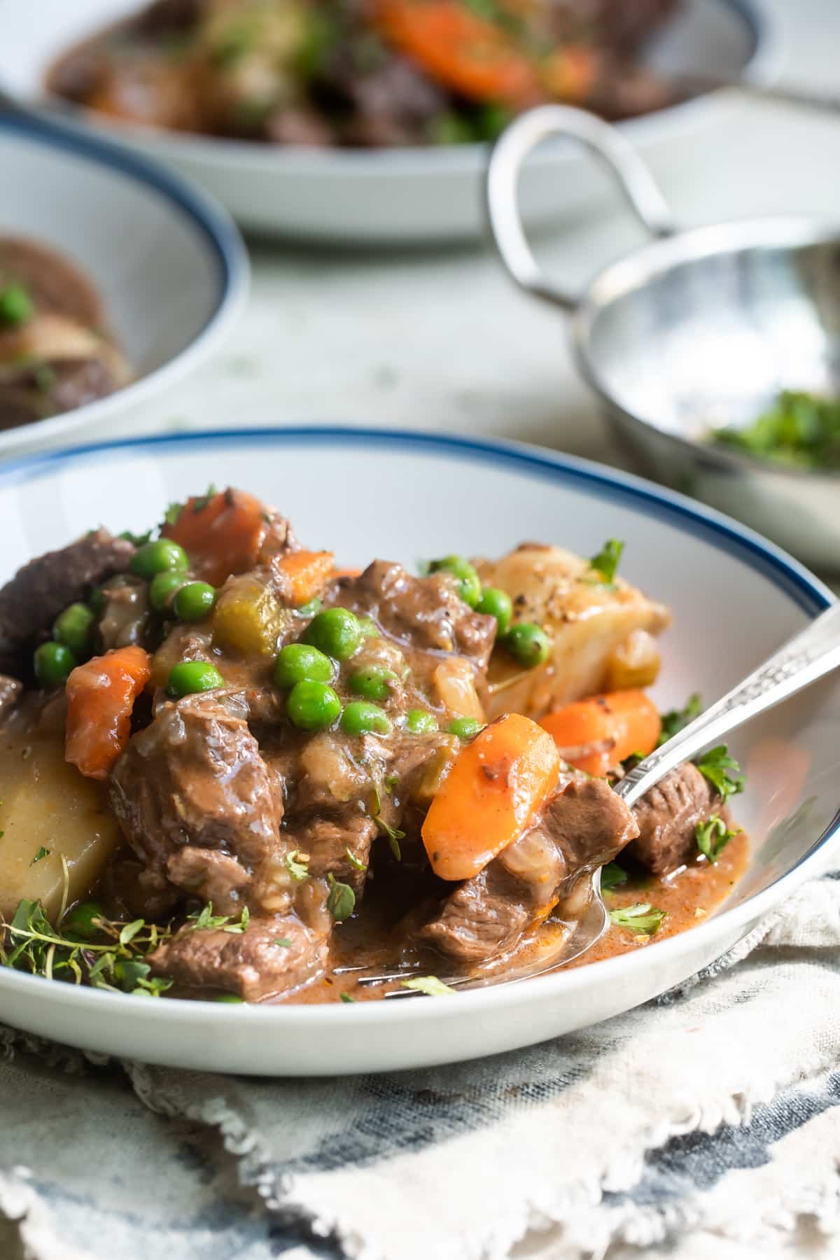 Bowls of venison stew on a table.