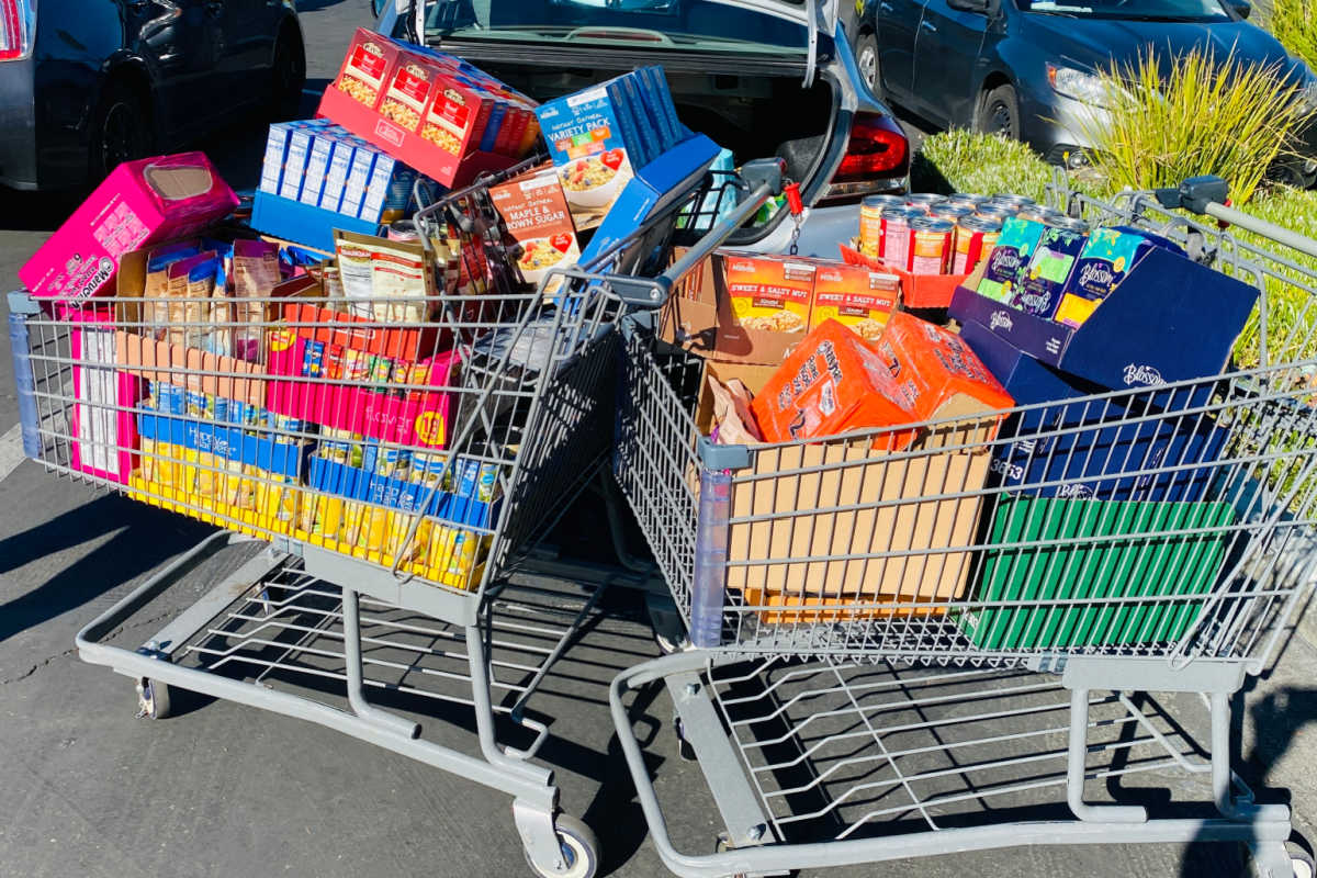 2 Shopping carts full of food donations at Aldi.