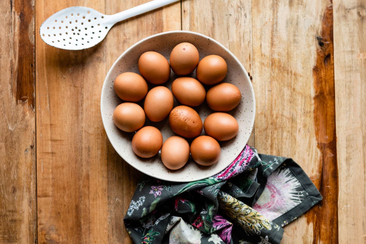 A bowl of farm-fresh brown eggs.