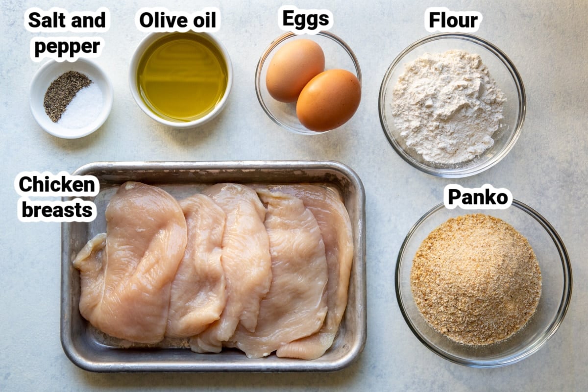 Labeled ingredients needed for breading chicken.