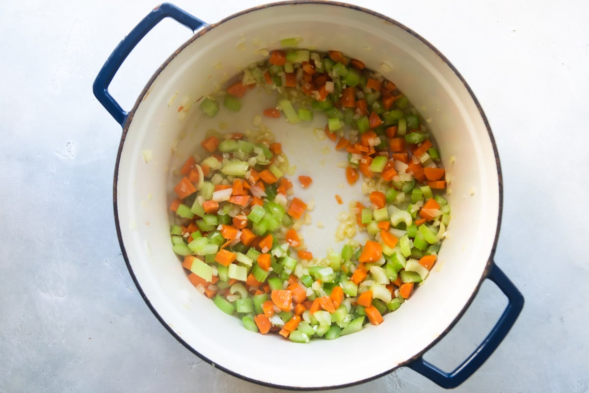 Carrots and celery in a pot.