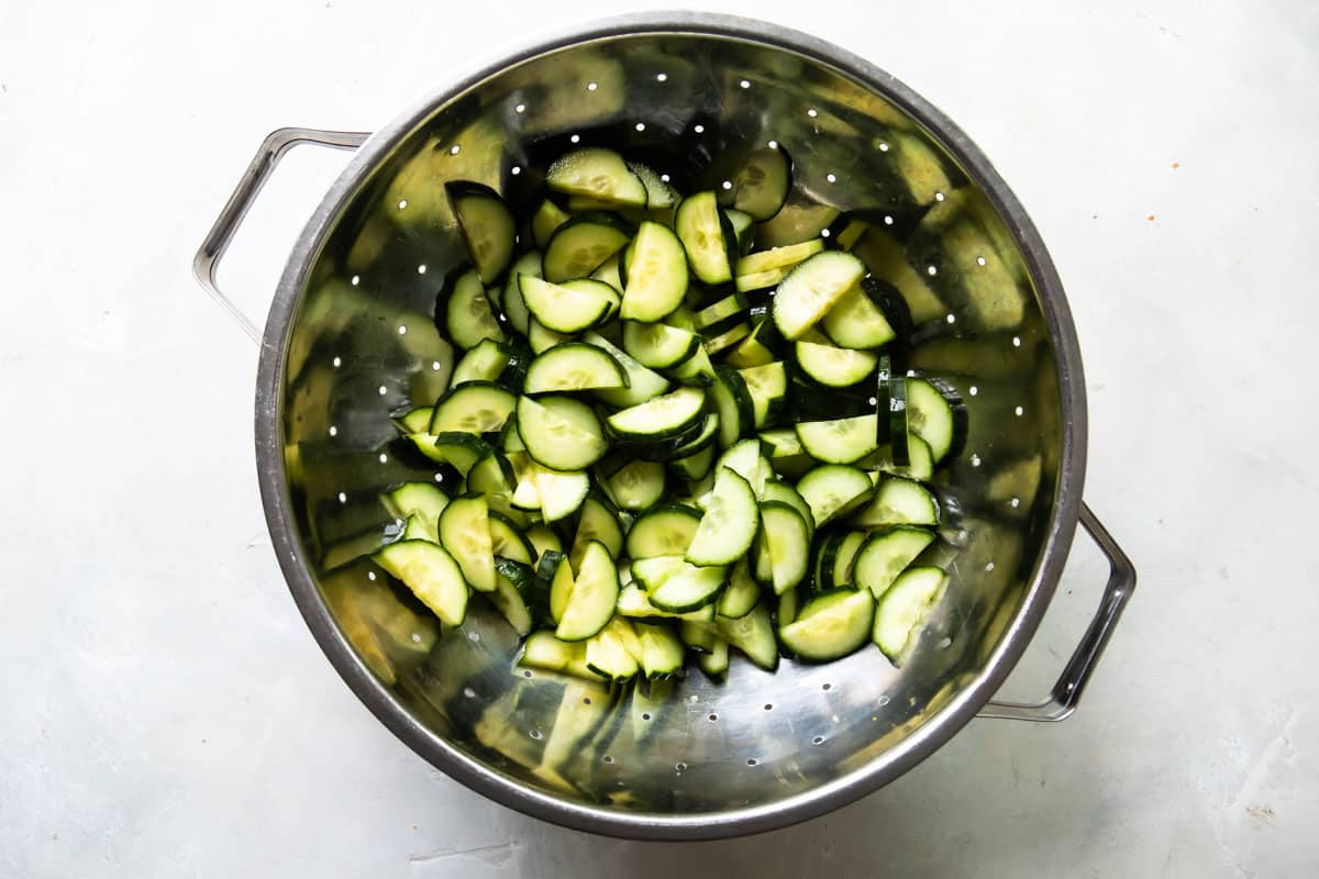 Cucumbers in a colander.