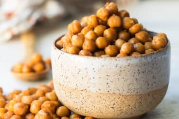Roasted chickpeas in a small ceramic bowl.