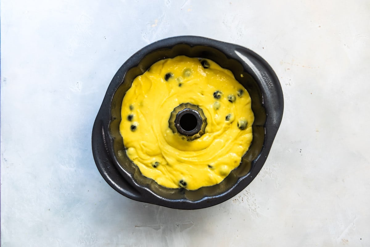 Lemon Blueberry Cake batter in a bundt pan.