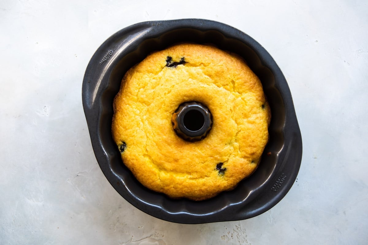 Lemon Blueberry Cake in a bundt pan after baking.