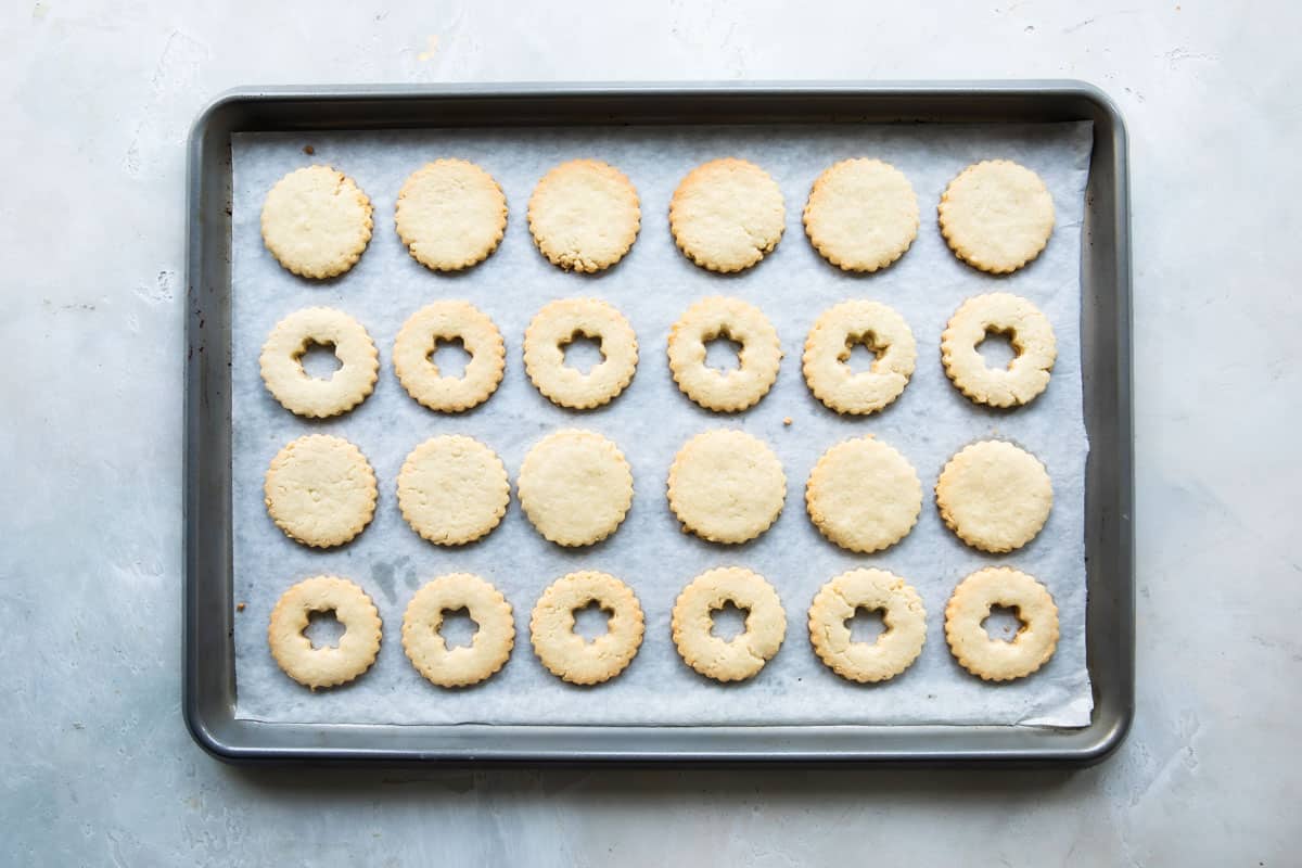 Linzer cookies after being baked in the oven.