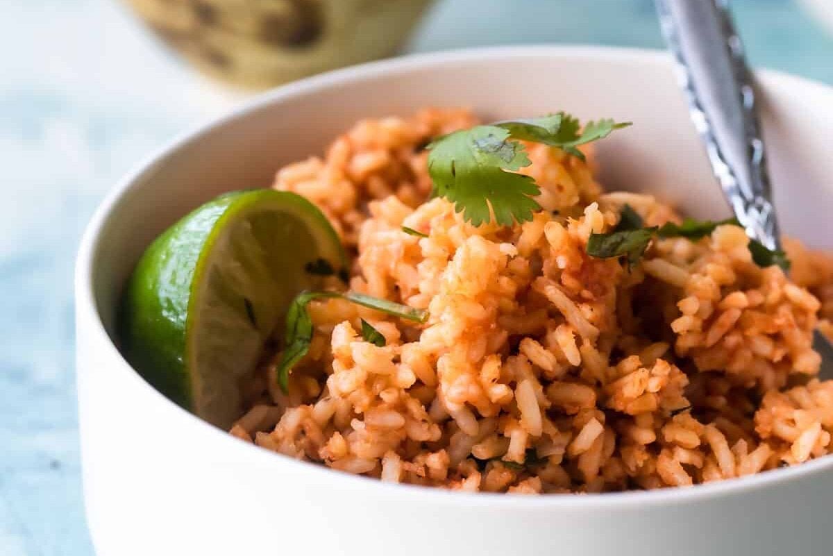Mexican rice in a white bowl.