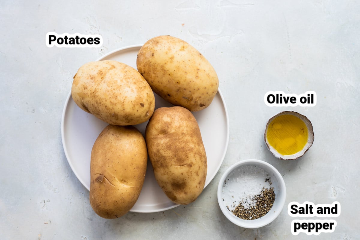 Labeled ingredients for air fryer baked potatoes.