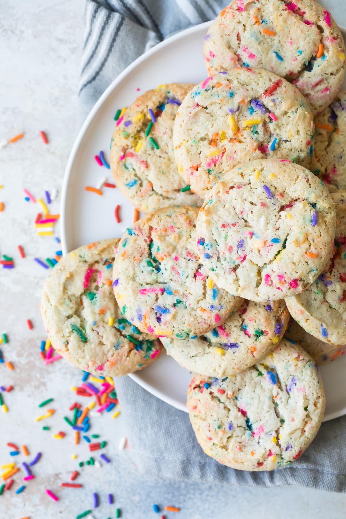 Confetti cookies on a white plate.